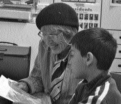 vol-rjorgenson-ravi FOL volunteer Ruth Jorgensen and Ravi read his new book.